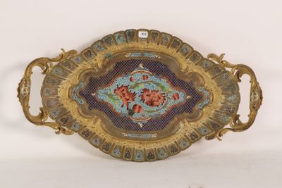 a decorative tray with flowers on it on a white surface
