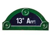 an image of a green and blue street sign on a white background