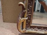 a picture of a mirror that is sitting on the ground