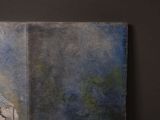 a painting on the wall of a room with a painting on it
