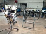 two chairs that are sitting in a garage