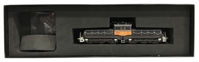 une image représentant une boîte noire avec un train noir et orange