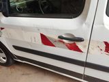 a white van with a red stripe on the side of it