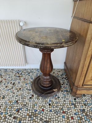 a small table that is on the floor in a room