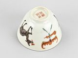 an image of a bowl with animals painted on it on a table