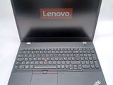 the lenovo laptop is open and ready to be used