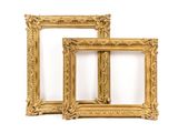 two gold picture frames on a white background with a white background