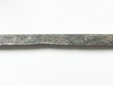 a close up of a knife with writing on it