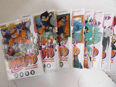 beaucoup de cartes à collectionner Dragon Ball sur la table