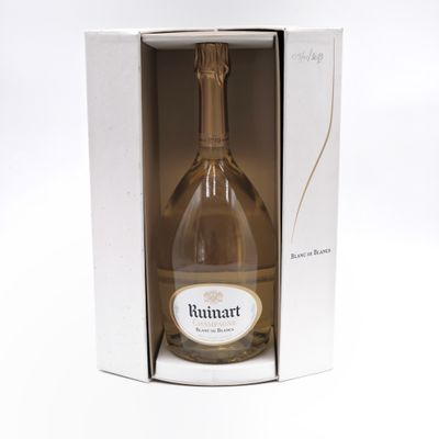 a bottle of wine in a box on a white surface