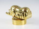tête d'éléphant plaquée or sur un socle plaqué or