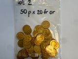 a bag of gold coins sitting on a table