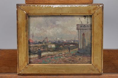 an oil painting of a cityscape in a wooden frame on a shelf