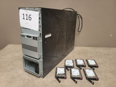 six hard drives and a hard drive on the table