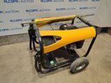 a small yellow boat sitting on top of a cart