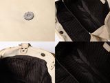 the inside of a beige purse with a zipper on it
