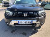 a picture of the front end of a black car