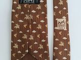 two neck ties with horses on them on a white background