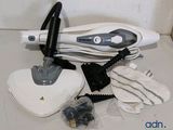 an image of a steam mop sitting on top of a counter