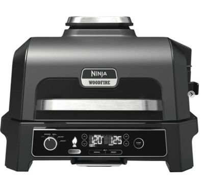 the grill is black and has a digital timer on it