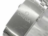 a watch that is on a bracelet with the word omega written on it