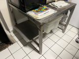 a microwave sitting on top of a table in a kitchen