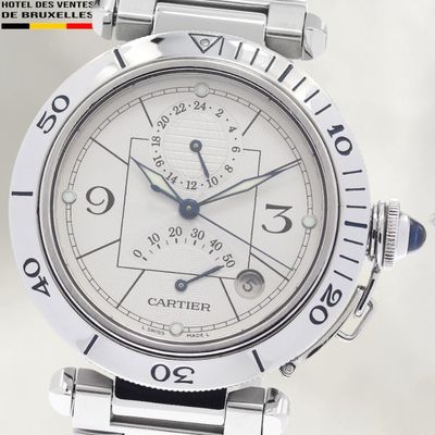 a close up of a wrist watch with a white dial