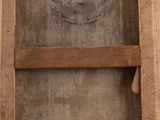 a picture of an old wooden frame with a clock on it