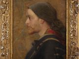 portrait of a man with a beard in a gold frame