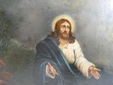 un tableau représentant Jésus assis par terre, les mains tendues