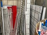 a pile of assorted metal items in a storage area