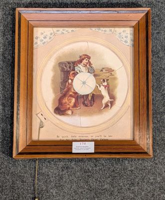 a clock hanging on the wall with a picture of a girl and a dog