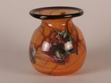 a small vase with a black rim on a white background