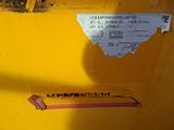 a sticker on the back of a yellow dump truck