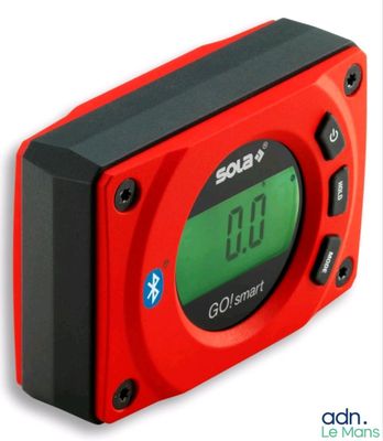 an image of a red and black alarm clock on a white background
