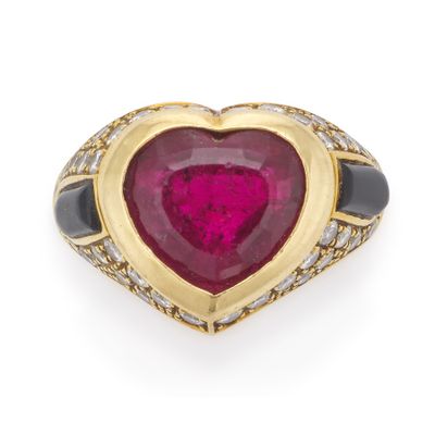 a ruby and diamond heart - shaped ring, by van cleef