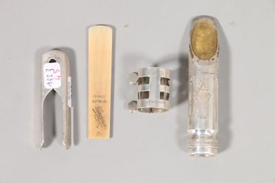 a toothbrush, toothpaste, and other items that are on a table