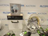 a box with a helmet, headphones, and other items on it