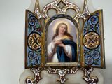 a picture of a woman holding a baby in a picture frame