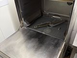 an open oven that is sitting in a kitchen