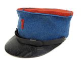 Qu'est-ce qui est bleu et rouge avec une bande noire ?