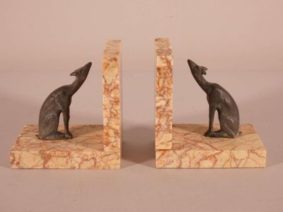 pair of art deco bookends of a cat and a dog