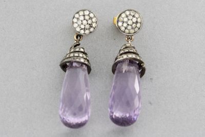 Paire de boucles d’oreilles en argent et or serties de diama…