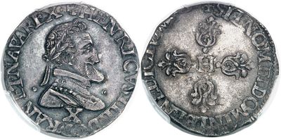 une pièce d'argent portant l'image d'un homme