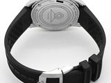a close up of a wrist watch on a white surface