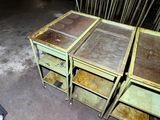 three tables with drawers that are sitting on the floor
