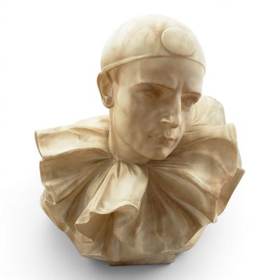 sculpture of a bust of a man with a hat on his head