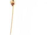 a toothpick with a flower on it and a toothpick with a flower on it