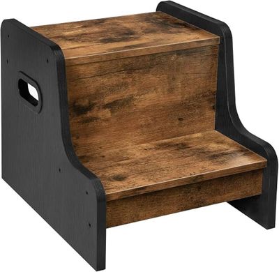 un tabouret en bois muni d'une poignée noire