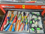 many different tools in a tool box on the table